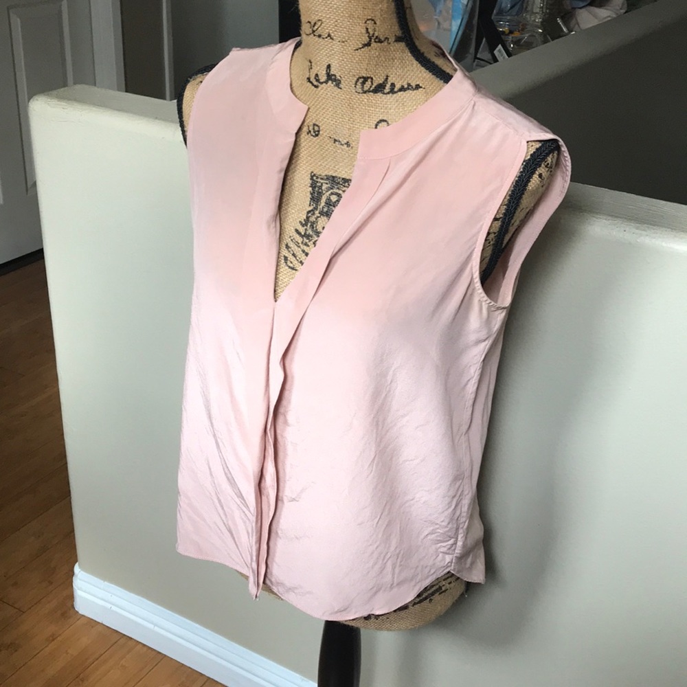 BCBG “Vanesa” sleeveless folded-placket top